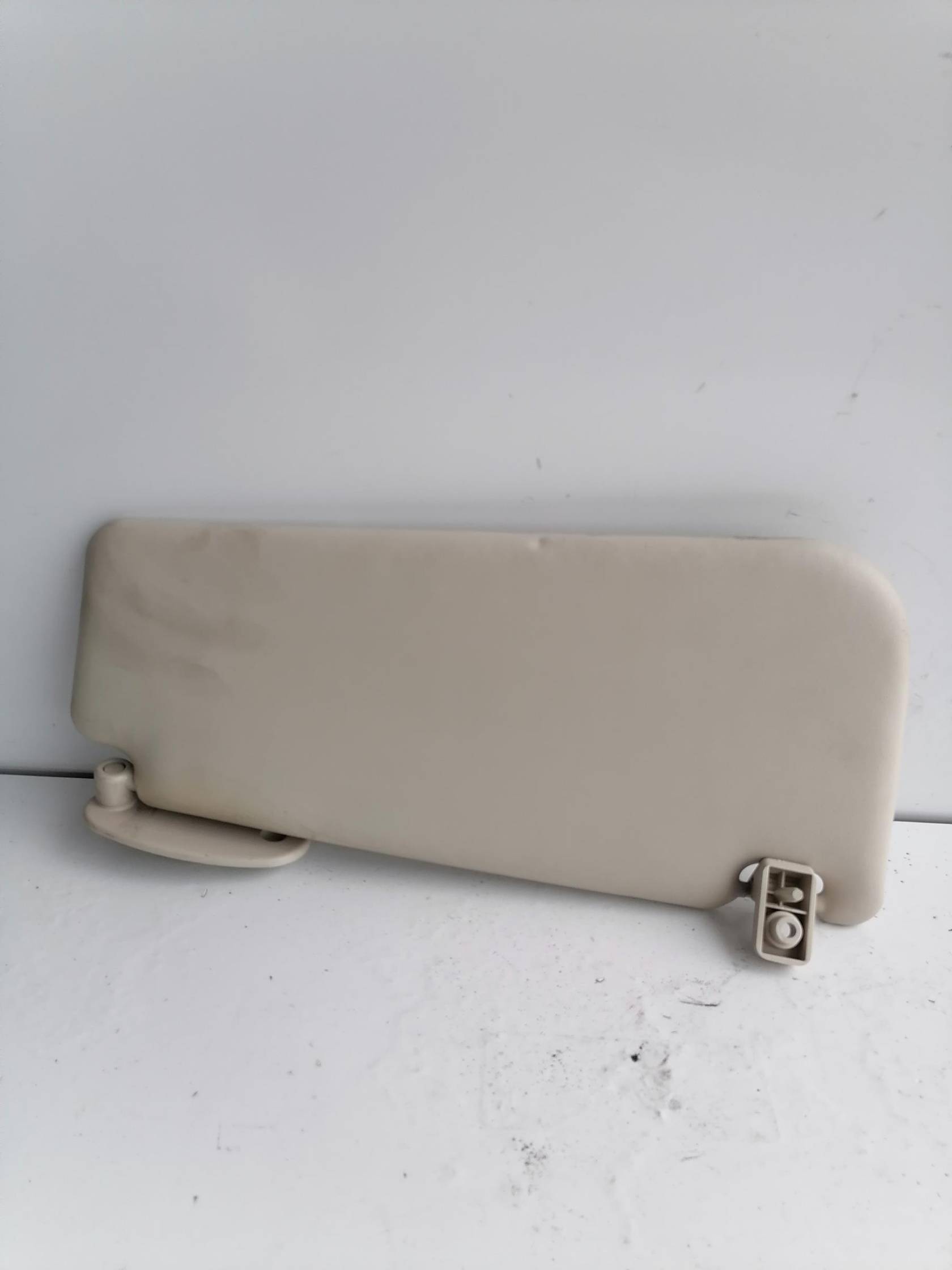 Aletta parasole parabrezza sx.